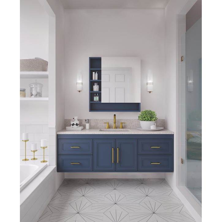 Bath and Bronze bathroom vanity with blue cabinetry, brass faucet, wall sconces, and patterned tile.