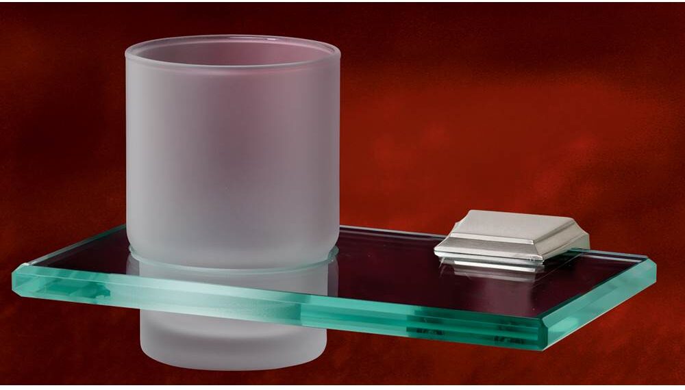 Glass bathroom shelf with frosted tumbler holder and satin nickel wall mount.