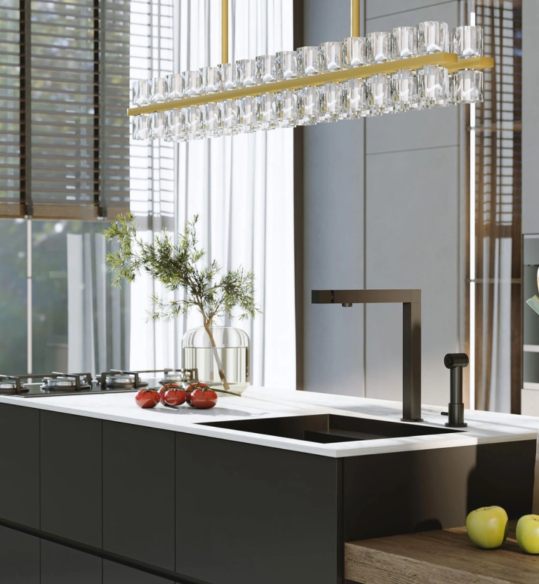 Contemporary kitchen with a crystal linear chandelier, dark cabinetry, a black faucet, and large windows filling the space with natural light.