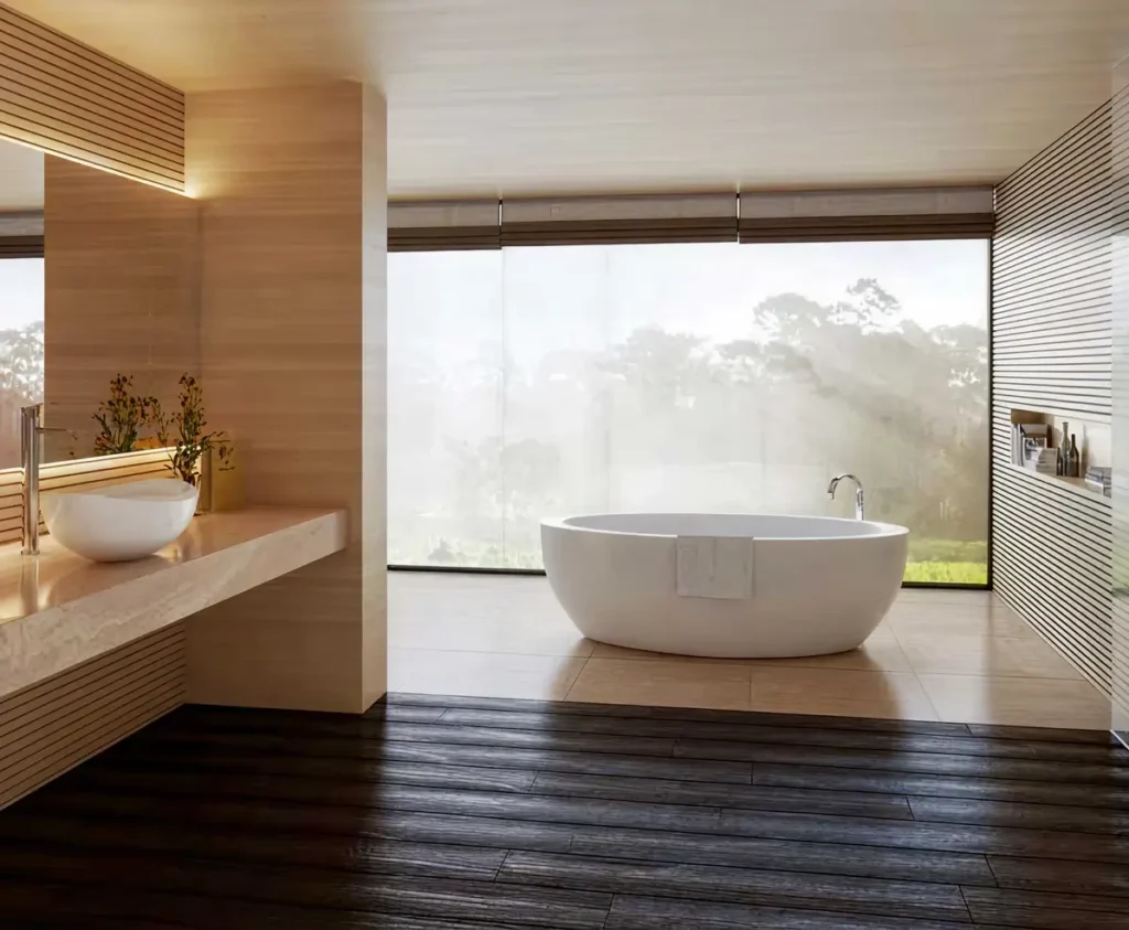 Bath & Bronze bathroom showroom with freestanding tub, wood vanity, large windows, and warm finishes.